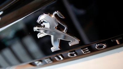 Peugeot logo pictured during the presentation of the company's financial results, Paris, Feb. 23, 2017.