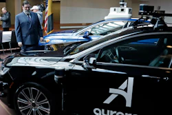 Pittsburgh Mayor William Peduto checks out autonomous vehicles designed by Aurora Innovations and Argo AI, March 4, 2019.