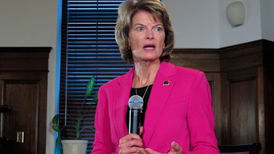 U.S. Sen. Lisa Murkowski speaks with reporters after a speech to the Alaska Legislature in Juneau, Feb. 18, 2020.