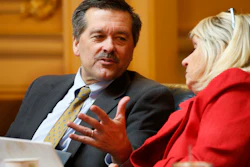 Del. Terry Kilgore R-Scott, left, talks with Del. Kathy Byron, R-Bedford, during a House session at the Capitol, Feb. 28, 2020, in Richmond, Va.