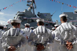 Sailors stand during a commissioning ceremony for the U.S. Navy guided missile destroyer USS Paul Ignatius, Port Everglades, Fort Lauderdale, Fla., July 27, 2019.