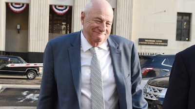 UAW official Edward Robinson leaves federal court in Detroit, March 2, 2020.