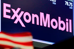 The logo for ExxonMobil above a trading post on the floor of the New York Stock Exchange, April 23, 2018.
