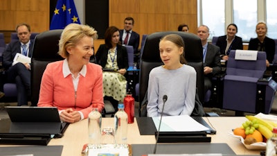 Swedish climate activist Greta Thunberg, right, and European Commission President Ursula von der Leyen attend the weekly College of Commissioners meeting at EU headquarters in Brussels, March 4, 2020.