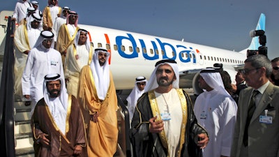 Sheikh Mohammed bin Rashid Al Maktoum, 3rd right, visits a FlyDubai aircraft at the Dubai Airshow, Nov. 15, 2009.