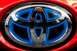 Toyota logo on the trunk of a 2018 Prius at the Pittsburgh Auto Show, Feb. 15, 2018.