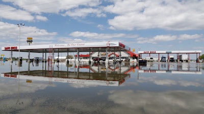 A Sapp Bros. gas station in Percival, Iowa, stands in floodwaters from the Missouri River, May 10, 2019.