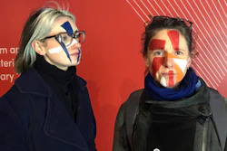 Artists Georgina Rowlands, left, and Anna Hart pose for a photo with their faces painted, Feb. 17, 2020.