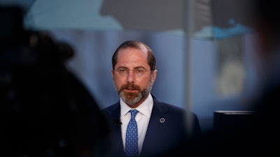 Health and Human Services Secretary Alex Azar speaks during a television interview outside the White House in Washington, March, 9, 2020.