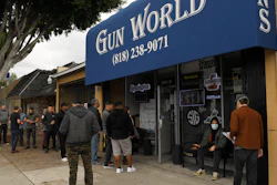 Gun store patrons wait in line in Burbank, Calif., March 15, 2020.