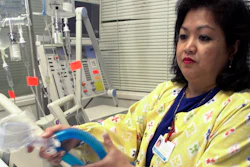 Lovely R. Suanino, a respiratory therapist at Newark Beth Israel Medical Center in Newark, N.J., demonstrates setting up a ventilator, May 25, 2005.