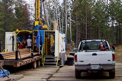 A prospecting drill rig bores into the bedrock near Ely, Minn., Oct. 4, 2011.