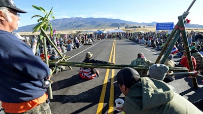Protesters at a vigil opposing the Thirty Meter Telescope at Mauna Kea, Hawaii, July 19, 2019.
