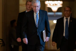 Senate Majority Leader Mitch McConnell, R-Ky., walks to the chamber at the Capitol, March 18, 2020.