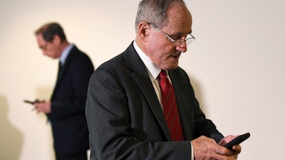 Sen. Jim Risch, R-Idaho, heads into a Republican policy lunch on Capitol Hill, March 19, 2020.