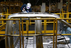 Ron Hudgins welds a 2015 Ford F-150 cab at the Dearborn Truck Plant, Dearborn, Mich., Nov. 11, 2014.