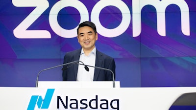 Zoom CEO Eric Yuan attends the opening bell at Nasdaq as his company holds its IPO in New York, April 18, 2019.