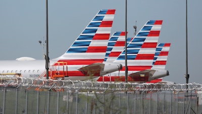 American Airlines planes at Dallas/Fort Worth International Airport, Grapevine, Texas, March 25, 2020.