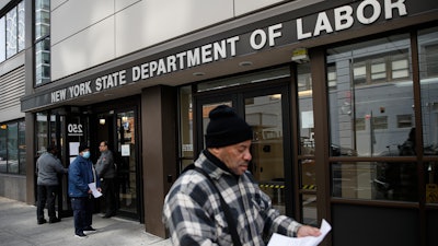 Visitors to the Department of Labor are turned away due to closures over coronavirus concerns in New York, March 18, 2020.