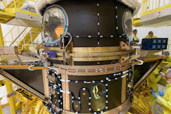 The European Space Agency's Cheops satellite is placed on a launch vehicle, Dec. 11, 2019.
