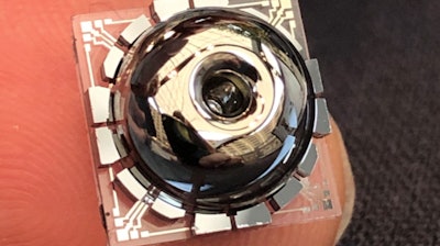 New resonator and electrodes shown on a finger for scale.