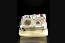 A device to capture carbon dioxide from the air and convert it to useful organic products.