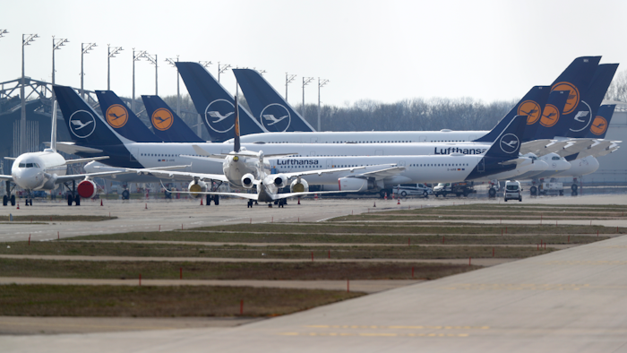 Lufthansa planes parked at the airport in Munich, March 26, 2020.