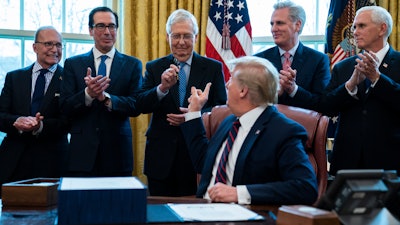 President Donald Trump after signing the coronavirus stimulus relief package in the Oval Office at the White House, March 27, 2020.