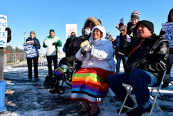 Opponents of the Keystone XL oil pipeline demonstrate in sub-freezing temperatures in Billings, Mont., Oct. 29, 2019.