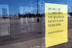 Sign at Romeo & Juliet Furniture and Appliances in Detroit, April 2, 2020.