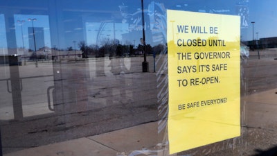 Sign at Romeo & Juliet Furniture and Appliances in Detroit, April 2, 2020.