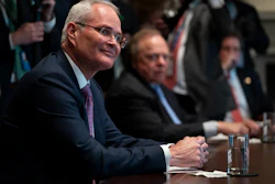 Exxon Mobil CEO Darren Woods during a meeting in the Cabinet Room of the White House, April 3, 2020.