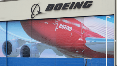 Mural of a Boeing 747-8 at the company's manufacturing facility in Everett, Wash., March 23, 2020.