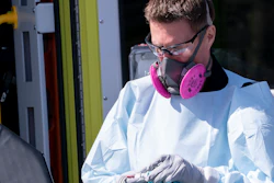 A paramedic cleans ambulance equipment after transporting a patient to Verdun Hospital in Montreal, April 6, 2020.