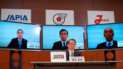 Toyota Chief Executive Akio Toyoda speaks during a video meeting at his office in Nagoya, April 10, 2020.
