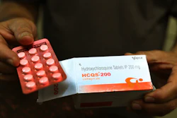 A chemist displays hydroxychloroquine tablets in New Delhi, India, April 9, 2020.