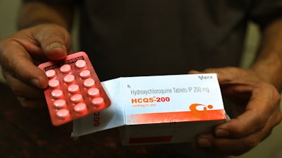 A chemist displays hydroxychloroquine tablets in New Delhi, India, April 9, 2020.