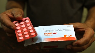 A chemist displays hydroxychloroquine tablets in New Delhi, India, April 9, 2020.