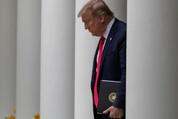 President Donald Trump arrives in the Rose Garden of the White House, April 14, 2020.
