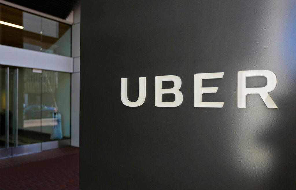 This March 1, 2017, file photo shows an exterior view of the headquarters of Uber in San Francisco. Toyota will sink a half-billion dollars into Uber and work jointly with the ride-hailing giant to develop self-driving vehicles, a person briefed on the matter said Monday, Aug. 27, 2018.