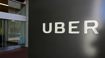 This March 1, 2017, file photo shows an exterior view of the headquarters of Uber in San Francisco. Toyota will sink a half-billion dollars into Uber and work jointly with the ride-hailing giant to develop self-driving vehicles, a person briefed on the matter said Monday, Aug. 27, 2018.
