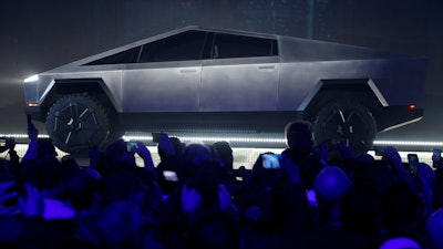 The Tesla Cybertruck is unveiled at Tesla's design studio Thursday, Nov. 21 in Hawthorne, CA.