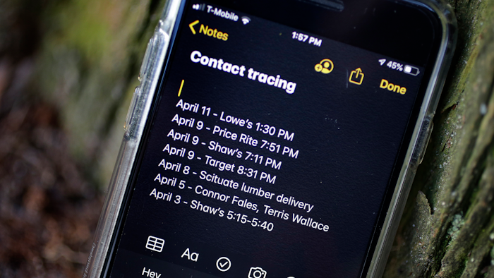 A smartphone belonging to Drew Grande, 40, of Cranston, R.I., shows notes he made for contact tracing, April 15, 2020.