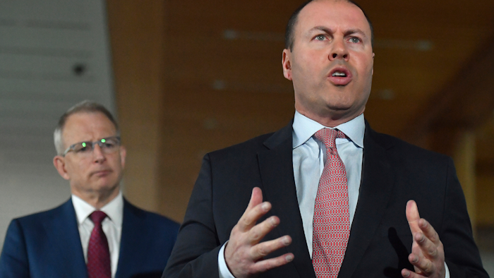 Australia Treasurer Josh Frydenberg, right, with Minister for Communications Paul Fletcher in Canberra, April 20, 2020.