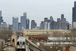 A CTA train travels west away from downtown Chicago, March 23, 2017.