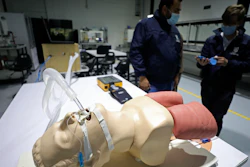 Prototype low-cost ventilator calibrated by La Sabana University engineers Julian Echeverry, left, and Andres Ramirez, Bogota, April 14, 2020.