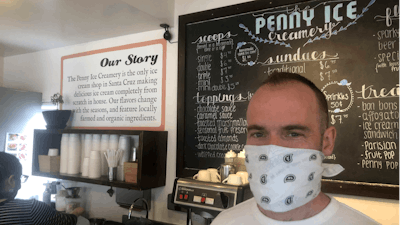In this April 17, 2020, photo, Zachary Davis poses for a photo at The Penny Ice Creamery in Santa Cruz, Calif.