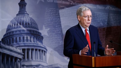 Senate Majority Leader Mitch McConnell speaks with reporters on Capitol Hill, April 21, 2020.