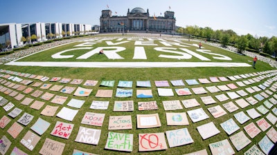 Activists from the Fridays for Future movement placed protest in front the German parliament building in Berlin, April 24, 2020.