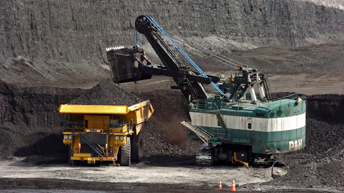 A mechanized shovel loads coal onto a haul truck at Cloud Peak Energy's Spring Creek mine near Decker, Mont., April 4, 2013.